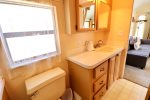 Private bathroom with walk in shower and provided towels 